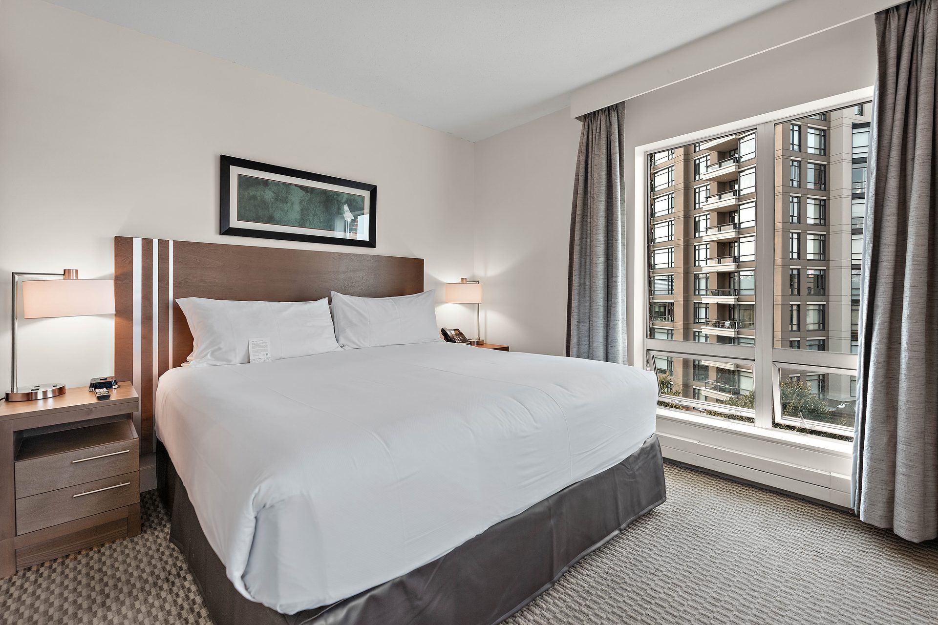 Parkside Hotel bedroom with city views