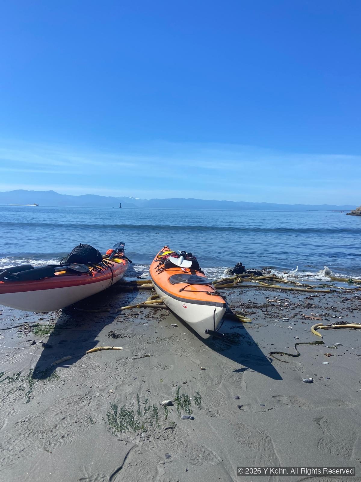 Kayaks on a beach in Victoria